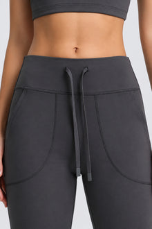 CloudDrape Wide-Leg Active Pants — close-up of the gray drawstring waist and curved pockets