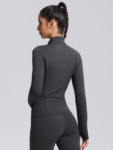DefineSculpt Stand-Collar Zip Jacket — back view of the dark fitted zip jacket