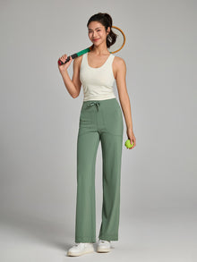 CloudDrape Wide-Leg Active Pants — green pants styled with a light tank and tennis racket