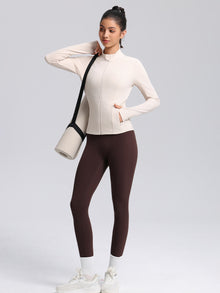 DefineSculpt Stand-Collar Zip Jacket — cream jacket styled with brown leggings